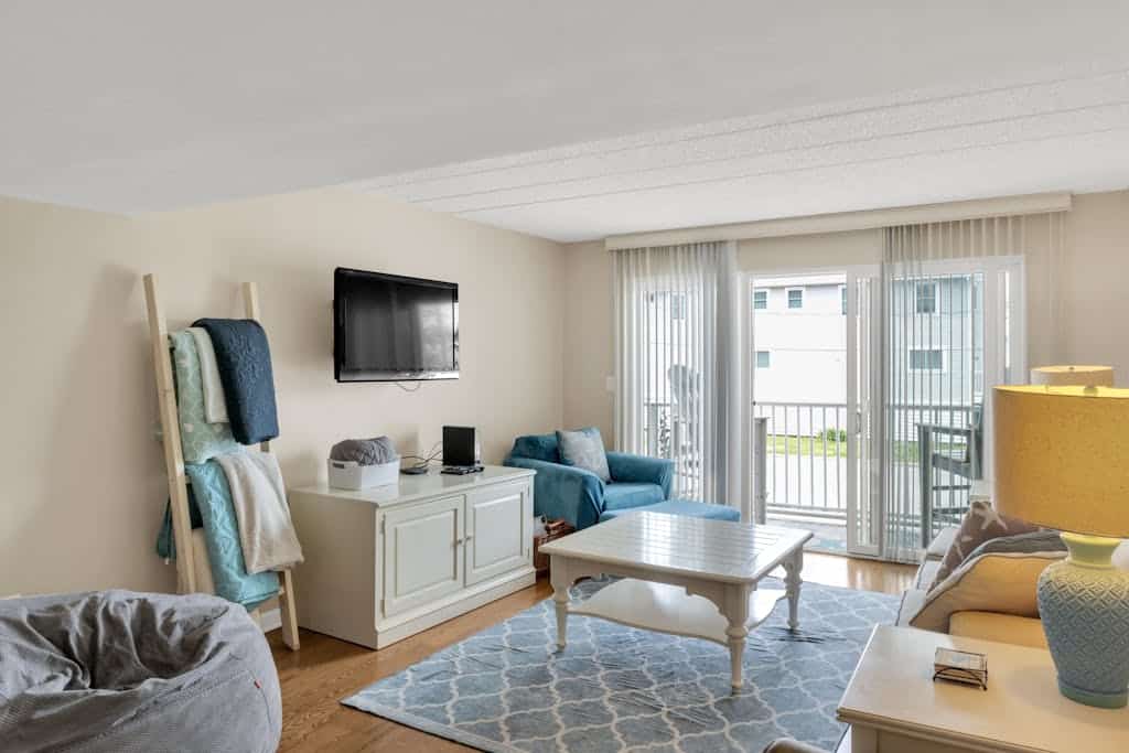 Town of Dewey Beach condo with marina views, pool, balcony