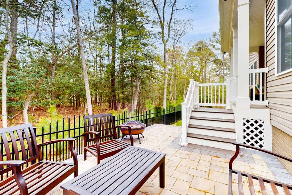 Upgraded home with pools, sports courts, bikes, chef's kitchen, firepit, & gym