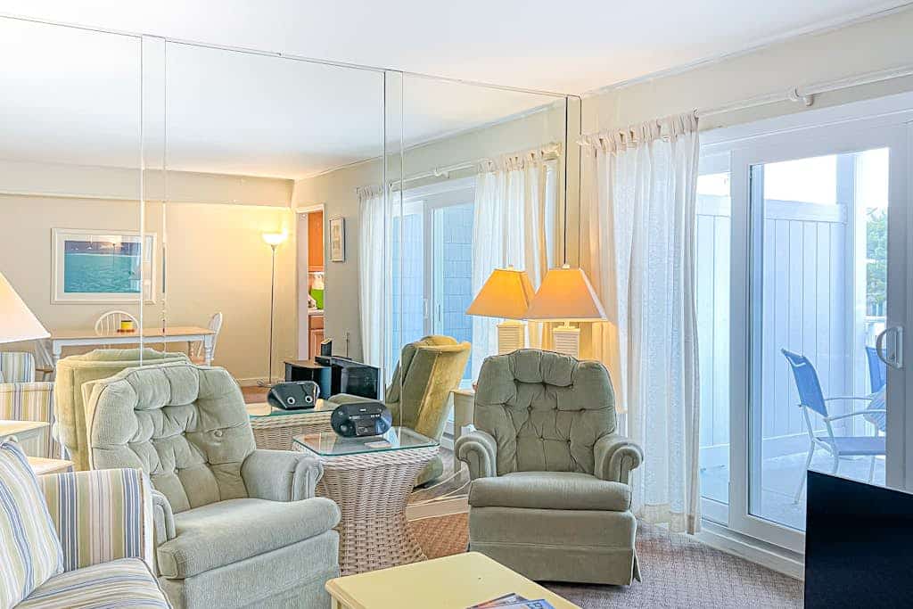 2nd-floor Sunspot condo steps from beach with balcony, outdoor shower, W/D, & AC