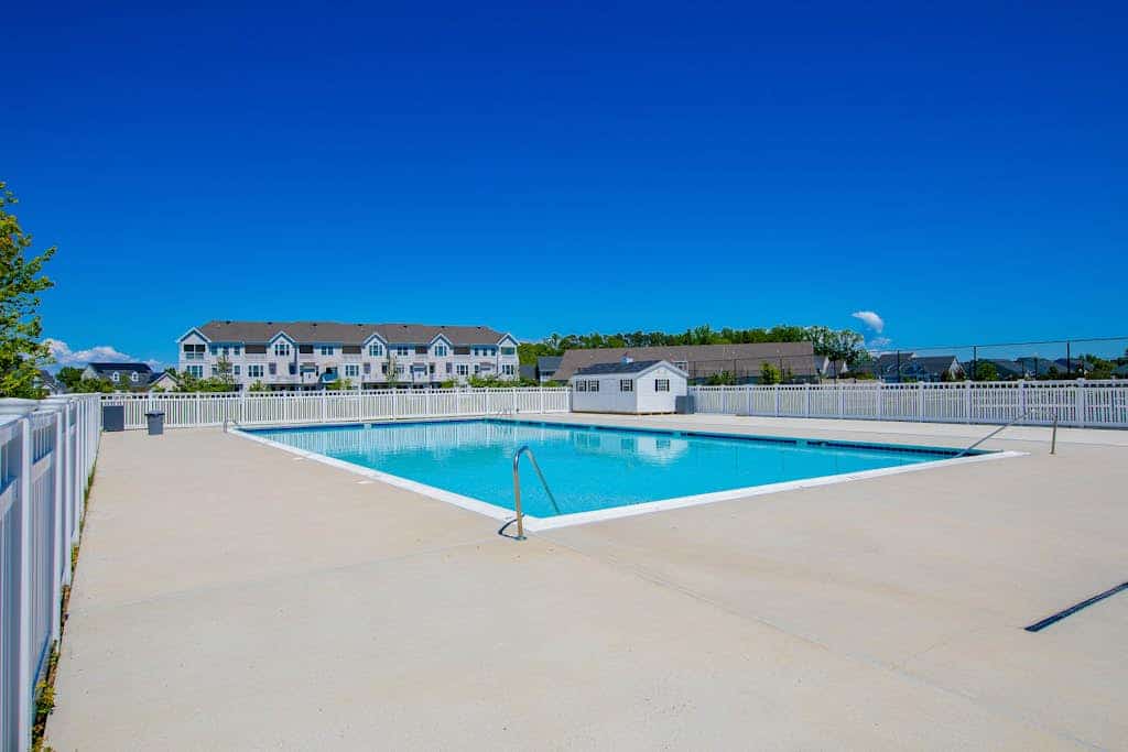 Grande at Canal Pointe condo with pools, tennis, gym, & private balcony
