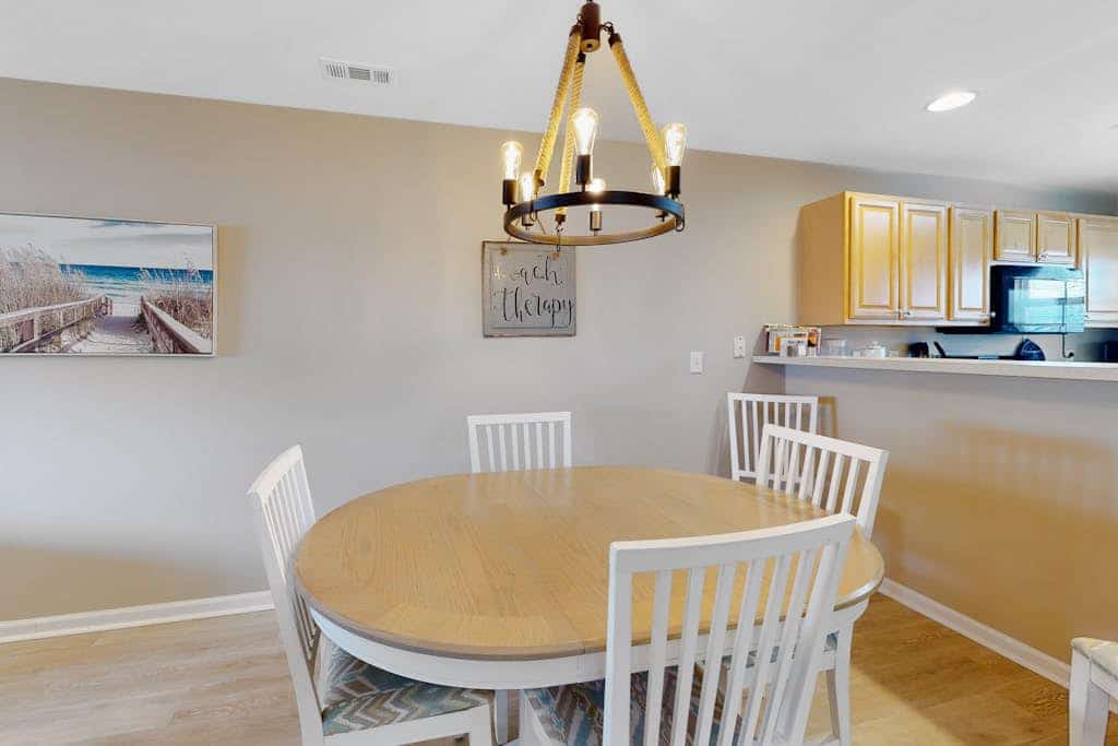 The Palms condo with a furnished balcony, pond view, washer/dryer, & pool