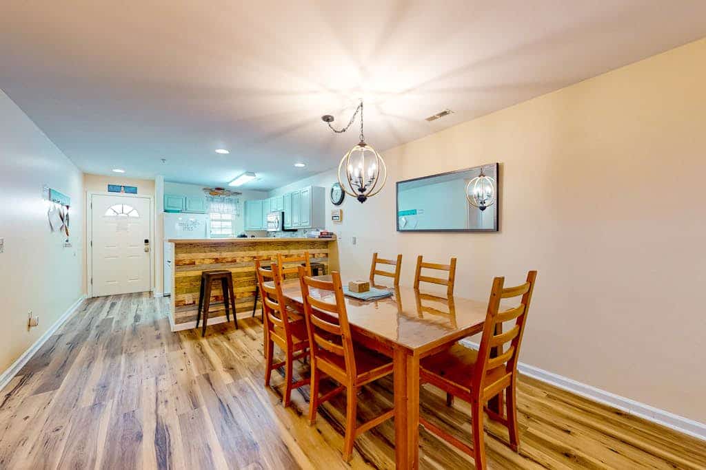 The Palms water-view condo near beach with outdoor pool, streaming, balcony, AC