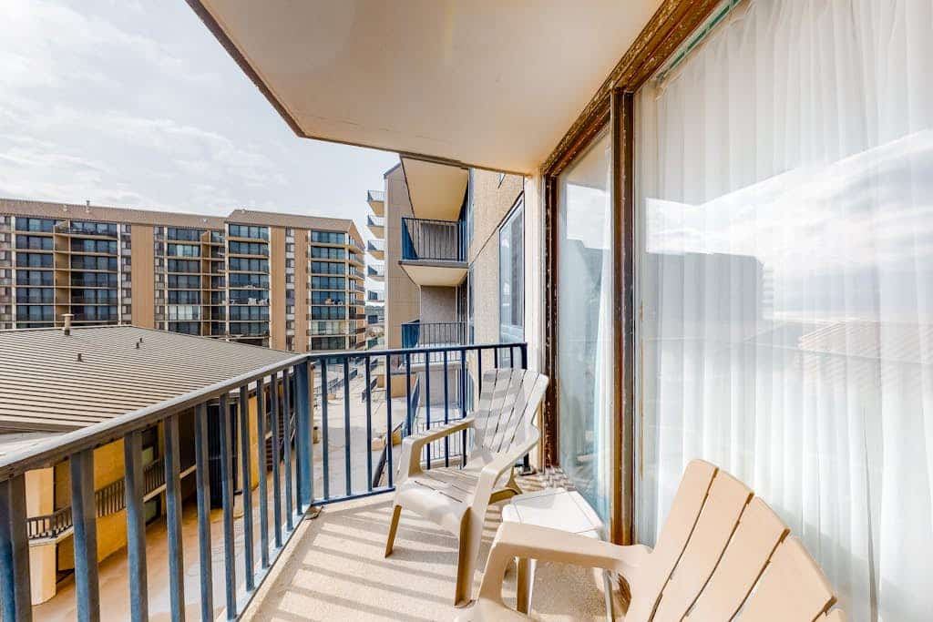 Sea Colony 4th floor condo with shared pool, basketball court - partial ocean view