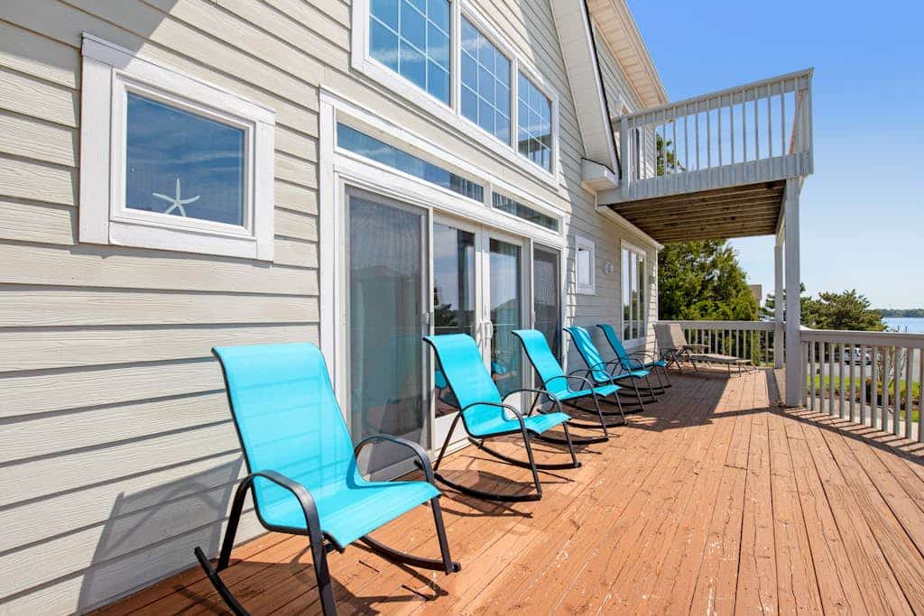 Quillens Point home w/ 5 decks, screened porch, grill & shared tennis - dogs OK