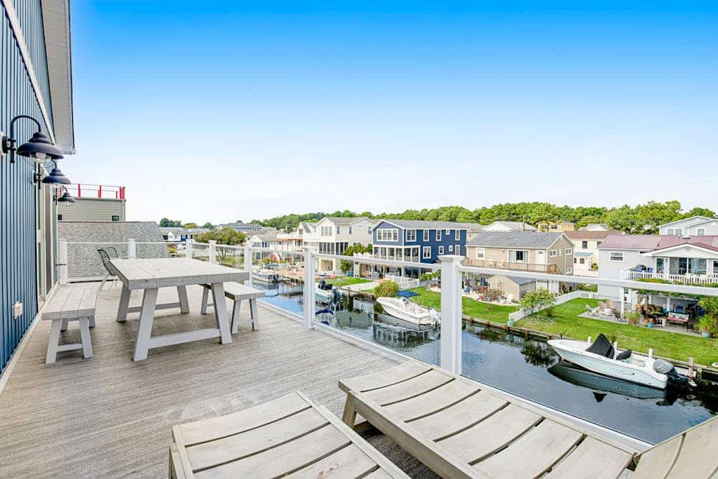 Town of South Bethany canal-front home with dock & decks - two blocks to beach