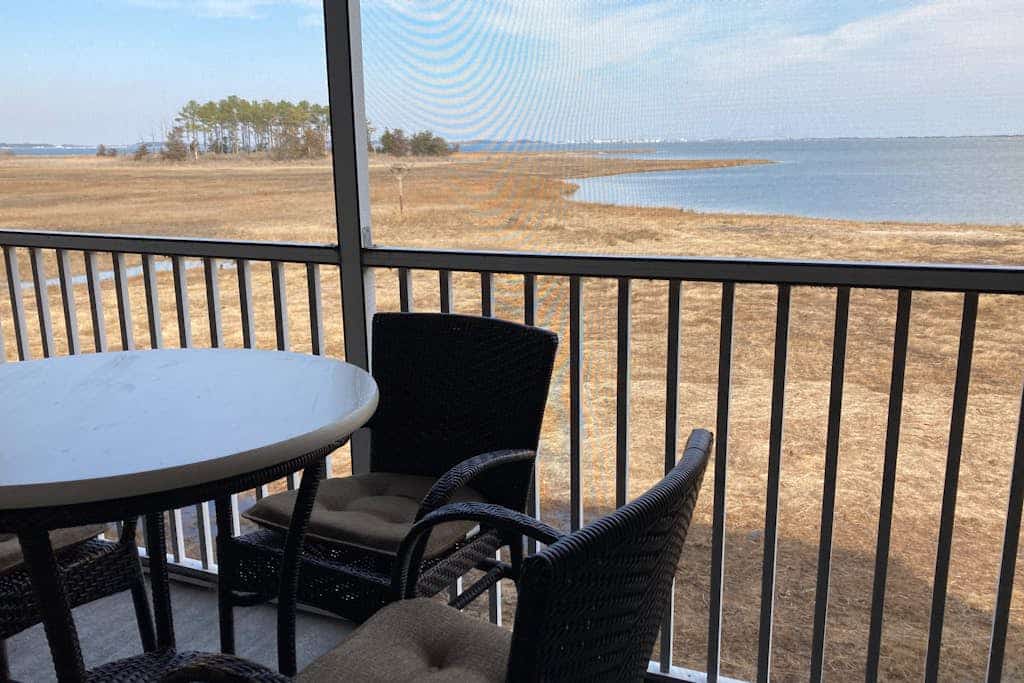 Stylish coastal gem with amazing river & bay views - steps to sandy beach