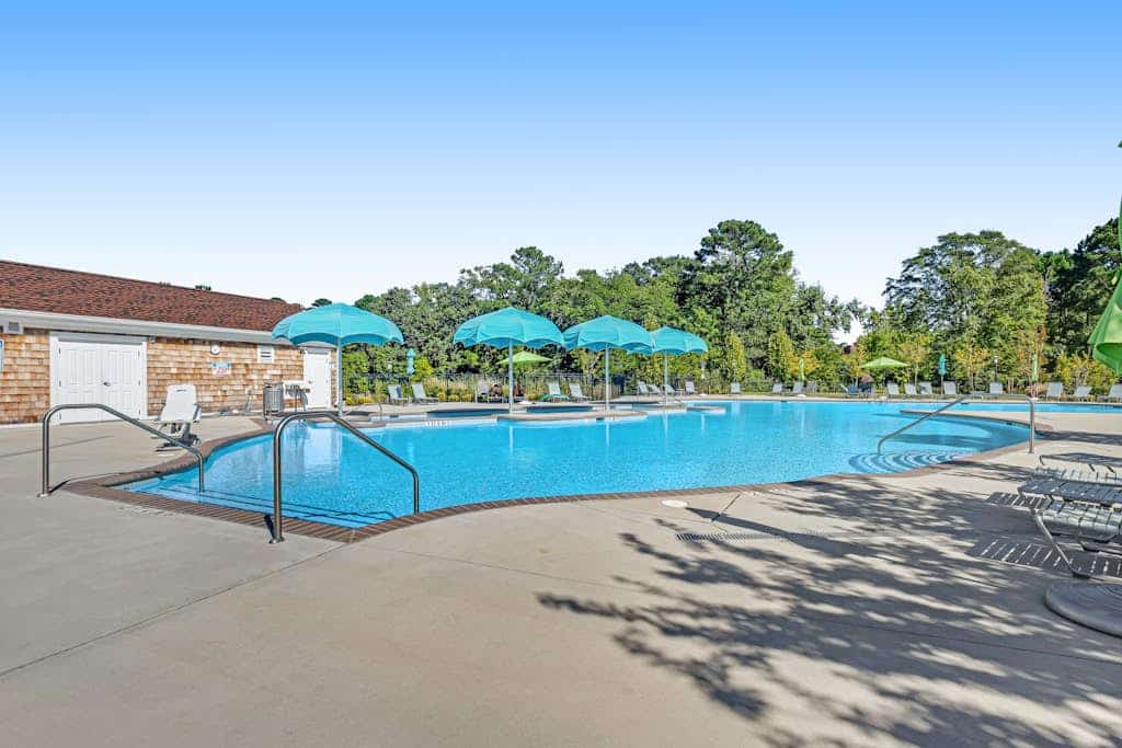 Spacious coastal home with pool & gym, fast WiFi, central AC & great location