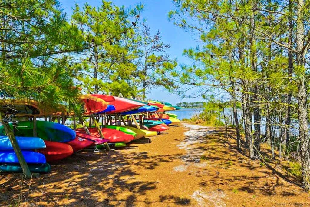 Salt Pond home with on-site golf, indoor/outdoor pools, gym, & sports courts