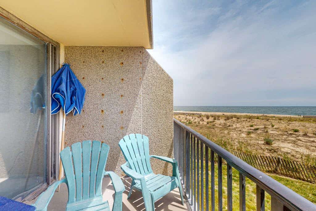 Sea Colony oceanfront condo with private balcony, shared pools, & gym