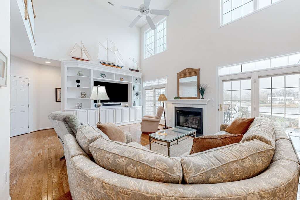 Bethany Lakes home with waterfront views, pool access, tennis, & private patio
