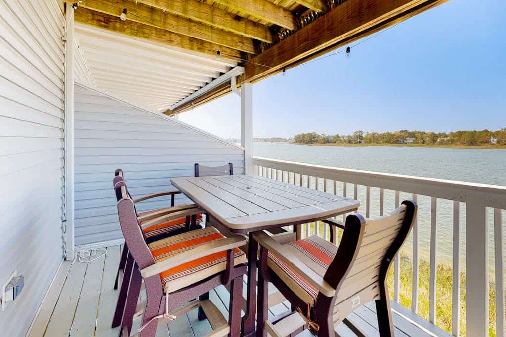 Bethany Marina bayfront condo with pool, fireplace, water views