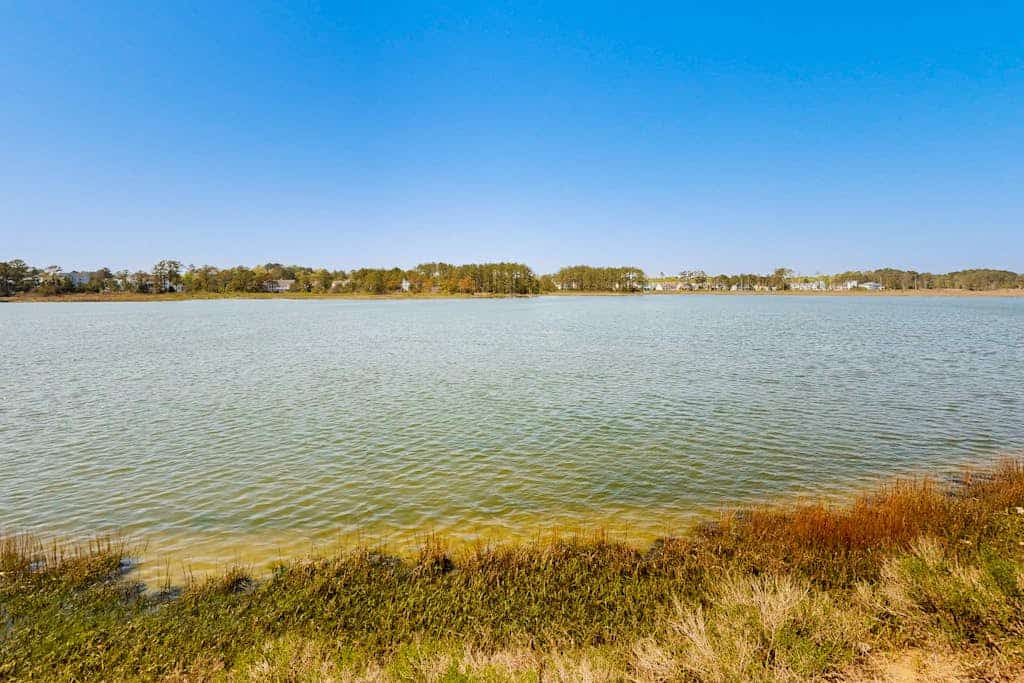 Bethany Marina bayfront condo with pool, fireplace, water views