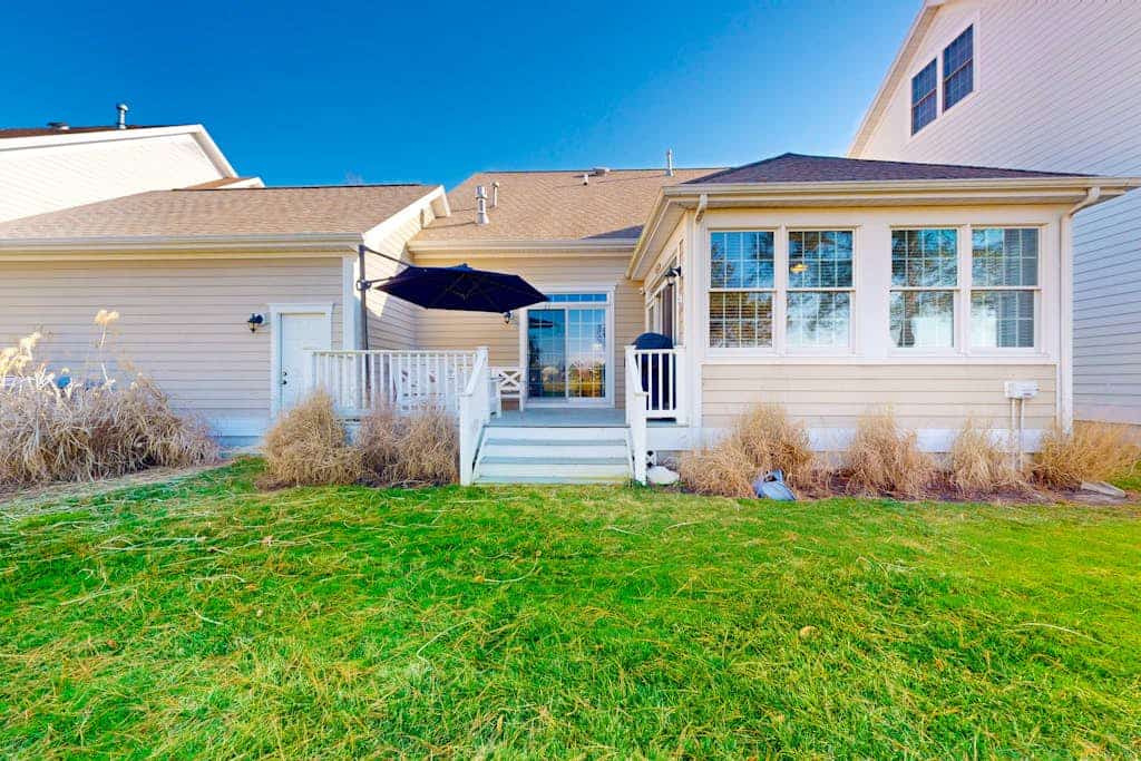 Bear Trap Dunes home with golf course views, deck, firepit, & amenity add-ons