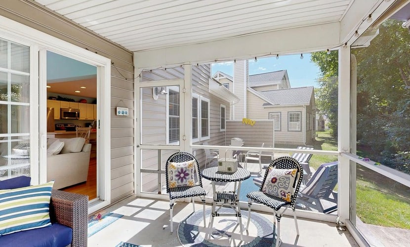 Updated Waterside home near beach with screened deck & community pool