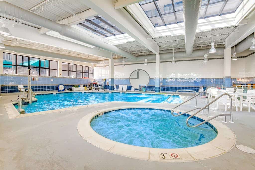 Sea Colony condo with 12 pools, sports courts, private beach, sauna, gym & porch