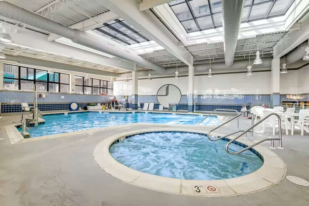 Sea Colony getaway with shared pools, hot tubs, tennis, & gym plus beach access
