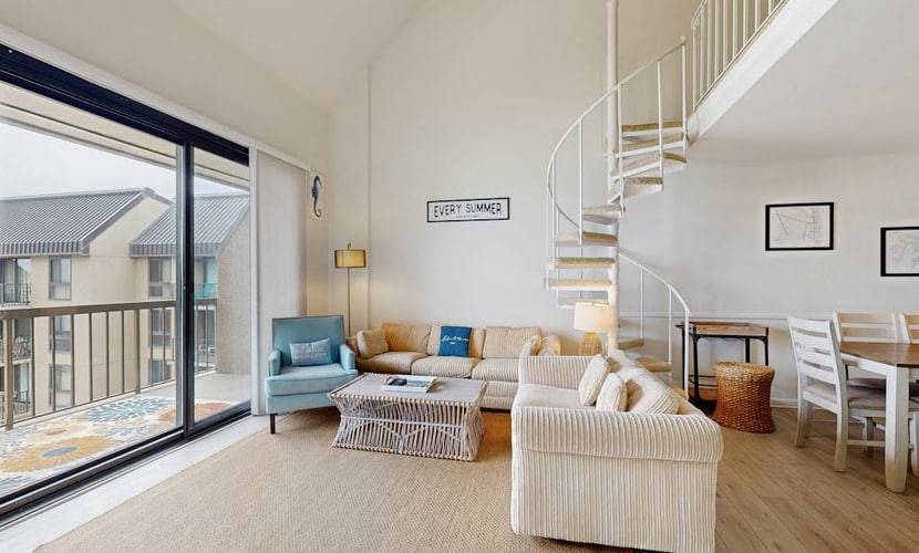 Sea Colony condo with pools, tennis, beach, hot tub, gym, sauna, & balcony