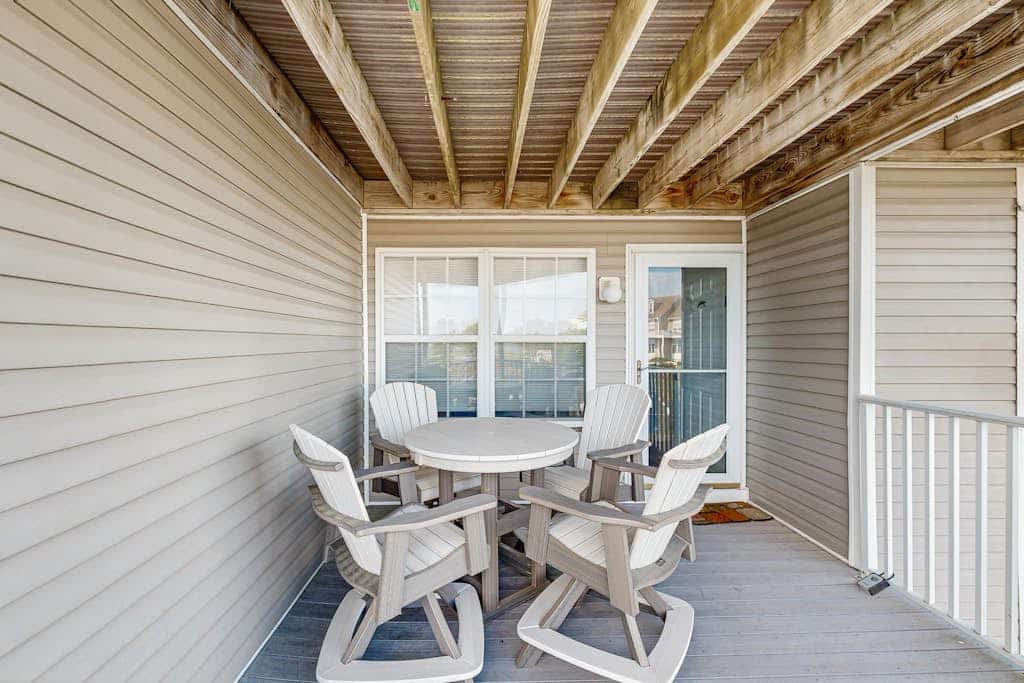 2nd-floor Bethany Bay condo with waterfront views & on-site golf/pool/tennis