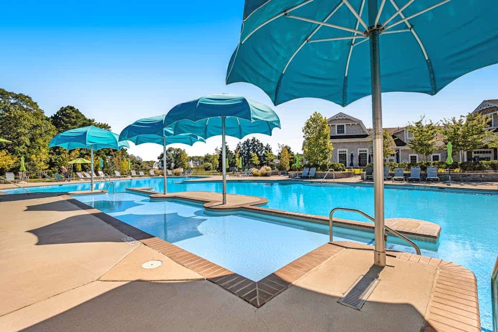 Ocean View Beach Club house with shared pool, sports courts, & gym