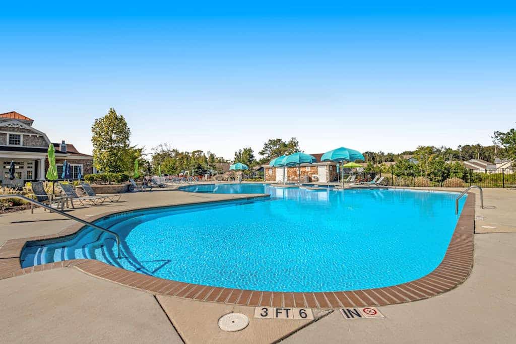 Luxury Ocean View Beach Club home with fireplace, pool, sports courts, & gym