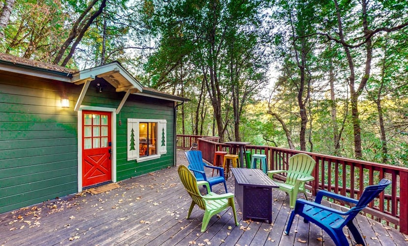 Slip into the hot tub as redwoods sway overhead and the forest settles into evening quiet. This dog-friendly hideaway brings your pup along for riverside adventures — the Russian River flows just 0.2 miles away. Cozy up with 4 in this colorful cabin after wine tasting at Porter Creek (2.1 mi) or paddling from Burke's Canoe Trips. Your forest retreat sits minutes from Forestville's tasting rooms yet feels worlds away in the trees.