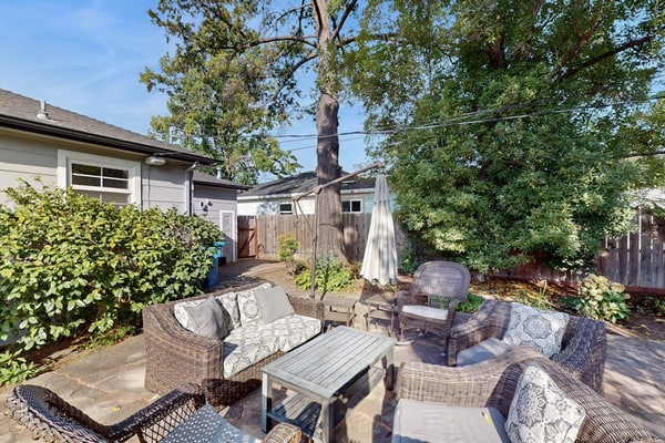 Sunlight floods the open living spaces while you sip morning coffee in this updated home in historic Grace Tract neighborhood in Santa Rosa. Gather on the private patio under mature shade trees, or fire up the gas grill for dinner al fresco. Your group of 4 enjoys modern comforts in a quiet residential neighborhood. Just 0.2 miles to Willi's Wine Bar and Pacific Market, with Russian River Valley wineries 15 minutes west. The perfect balance of neighborhood charm and wine country access awaits.