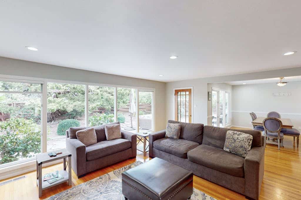 Sip morning coffee in the sun-filled breakfast nook of this renovated 1950s ranch on a quiet Santa Rosa corner lot, then point the car toward Russian River Valley, Dry Creek, Alexander Valley, or Sonoma Valley tasting rooms — all within reach. Two bedrooms sleep 4 between a king and a queen, with two full baths, a private tree-shaded patio, and central AC for the warm afternoons home.