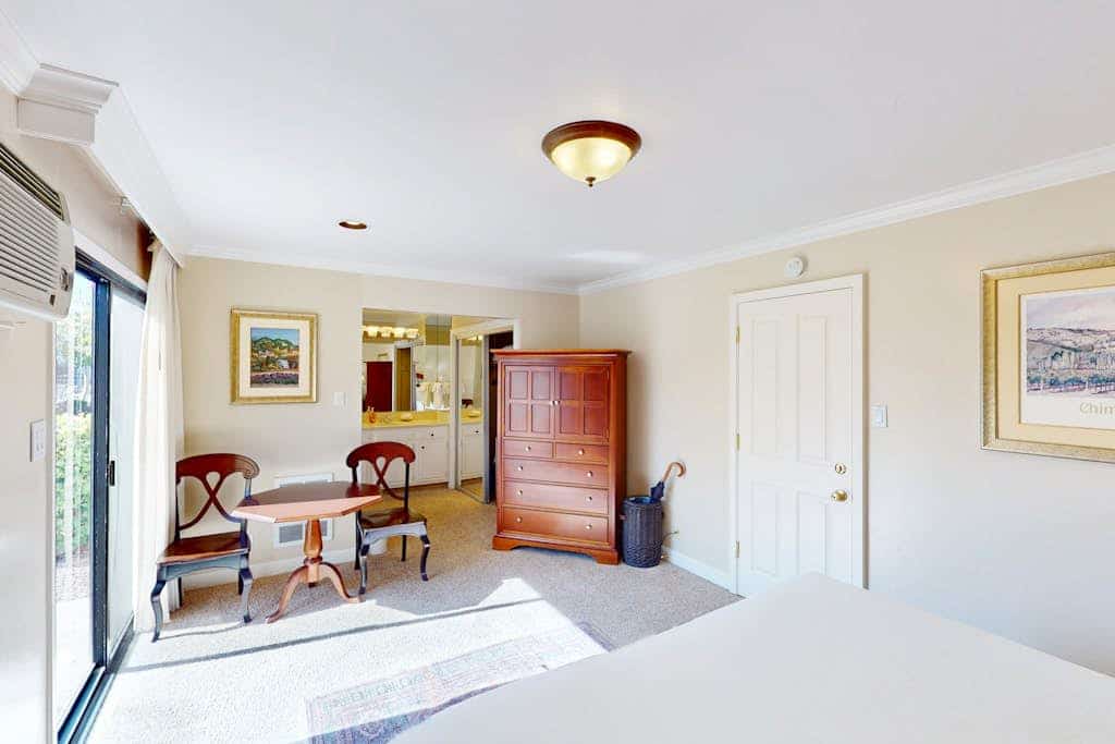 This ground-floor studio sits in the heart of Silverado Resort, its sliding glass doors opening straight onto the golf course — and the west-facing patio is made for sunset wine. Sleeps 2 in a king bed, with a kitchenette for light meals and the seasonal community pool about 50 feet from your door. The Silverado Trail's wineries begin just outside the gates; downtown Napa and Oxbow Public Market are 2 miles south.