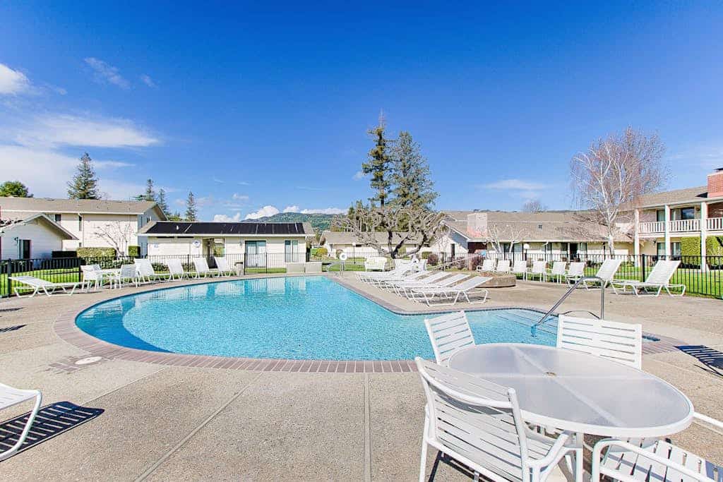 Morning light filters through your sliding doors as the golf course stretches out below your private balcony. This refined two-bedroom condo puts you inside Silverado Resort, where two championship courses meet world-class dining. Each suite has its own king bed and bathroom for ultimate privacy. You're steps from the community pool and a quick stroll to The Grill. Downtown Napa's 55+ tasting rooms await just 10 minutes away. Your wine country escape starts where the fairways meet the vines.