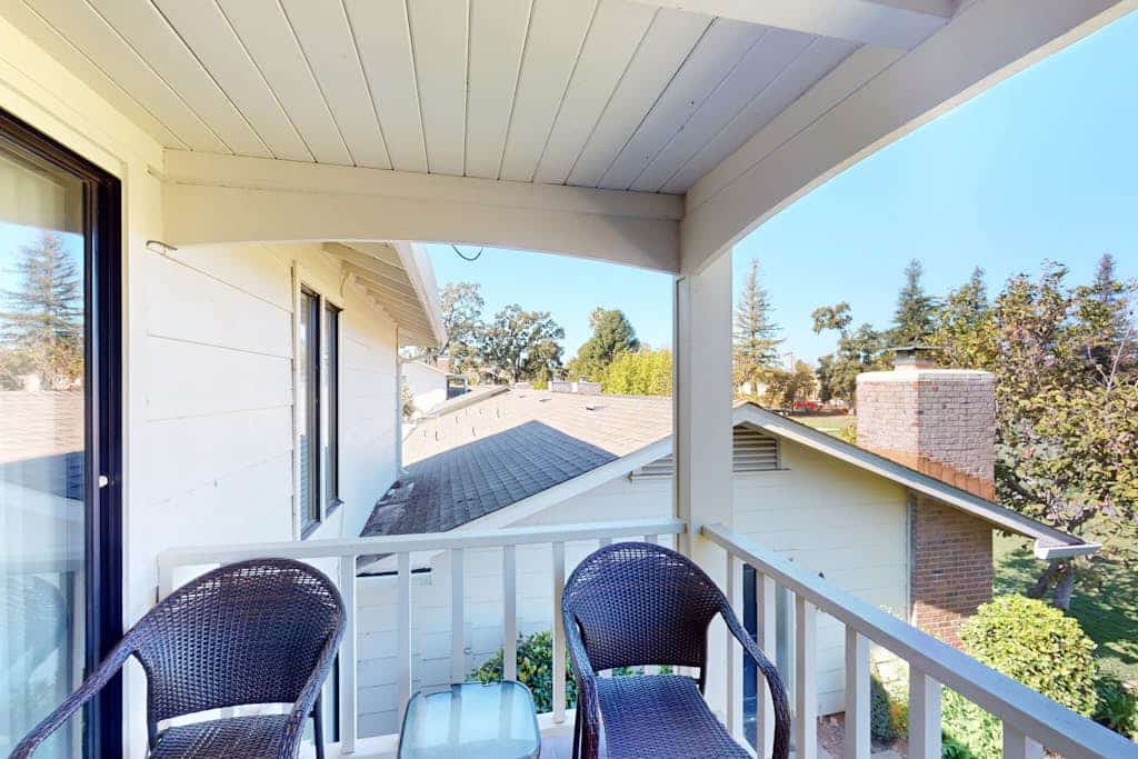 Morning light filters through your sliding doors as the golf course stretches out below your private balcony. This refined two-bedroom condo puts you inside Silverado Resort, where two championship courses meet world-class dining. Each suite has its own king bed and bathroom for ultimate privacy. You're steps from the community pool and a quick stroll to The Grill. Downtown Napa's 55+ tasting rooms await just 10 minutes away. Your wine country escape starts where the fairways meet the vines.