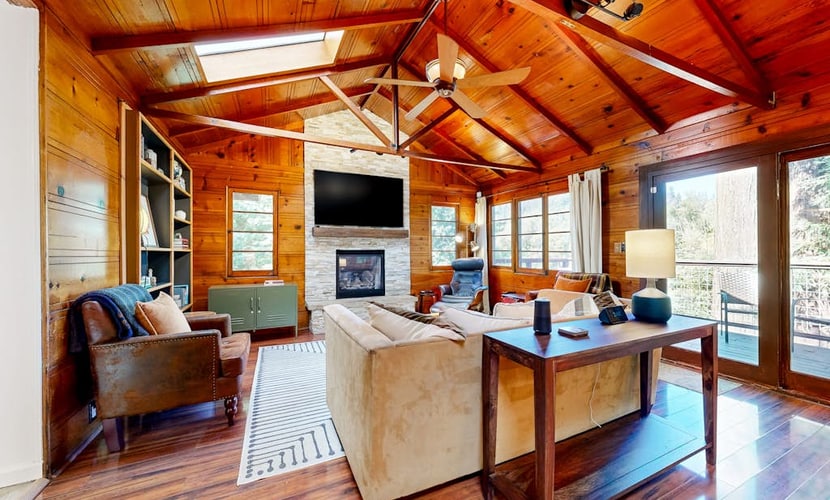 The Russian River flows just below your private deck at this cozy cabin, where kids play in the sandbox below. Soak under the stars in your hot tub after wine tasting at Joseph Jewell (2.3 mi) or paddling from Steelhead Beach (0.6 mi). This 3-bedroom cabin sleeps 4 in forest serenity. Fire up the gas grill for dinner on the multi-tiered deck while kids play in the sandbox below. Your redwood retreat sits just minutes from Forestville's tasting rooms and the river's best swimming holes.