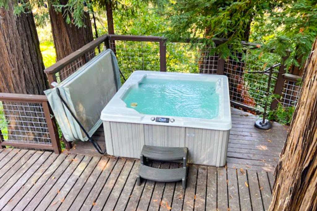 The Russian River flows just below your private deck at this cozy cabin, where kids play in the sandbox below. Soak under the stars in your hot tub after wine tasting at Joseph Jewell (2.3 mi) or paddling from Steelhead Beach (0.6 mi). This 3-bedroom cabin sleeps 4 in forest serenity. Fire up the gas grill for dinner on the multi-tiered deck while kids play in the sandbox below. Your redwood retreat sits just minutes from Forestville's tasting rooms and the river's best swimming holes.