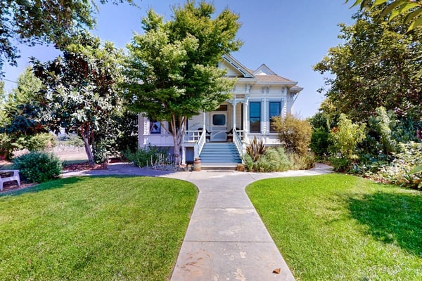 An 1895 Victorian turret door opens to wine country magic at this Magnolia Ranch cottage. Sip morning coffee on the gingerbread-trimmed porch as vineyard rows stretch to distant mountains. This colorful 2-bedroom retreat sleeps 4 amid crown molding and original hardwood floors. Just 1.3 miles from Healdsburg Plaza's tasting rooms and SingleThread. Set on a working vineyard, you'll enjoy the authentic Alexander Valley wine country experience.