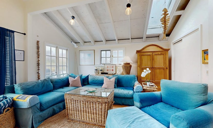 Salmon Creek flows past your deck as harbor seals play in the tidal waters below. Curl up by the gas fireplace with your pup after exploring the beach — just a short walk away. This intimate cottage for two sits directly on the water with sweeping views across the creek to distant hills. Spud Point's legendary crab sandwiches are 1.5 miles south. Your front door opens to the wild Sonoma Coast, where gray whales pass in winter and the sound of the Pacific carries on the breeze.