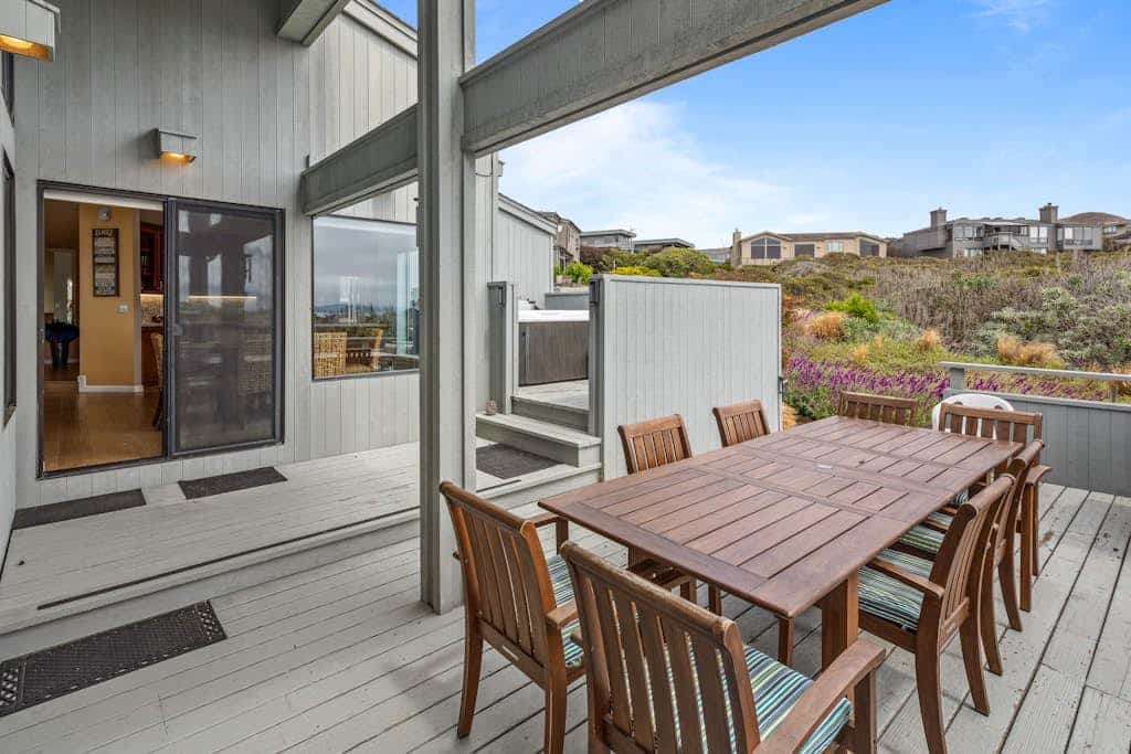 Feel the salt breeze from your private hot tub as the sun sets over the Pacific. This three-story contemporary retreat in Bodega Harbour sleeps 6 in three king suites, each with its own smart TV and luxe bedding. The expansive deck hosts dinner for 10 under the stars. Just 1.4 miles from Doran Beach and 2.3 miles from the headland's whale watching trails. Pour a glass of local wine, sink into the bubbling water, and let the ocean rhythms reset your pace.