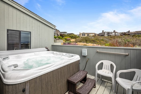 Feel the salt breeze from your private hot tub as the sun sets over the Pacific. This three-story contemporary retreat in Bodega Harbour sleeps 6 in three king suites, each with its own smart TV and luxe bedding. The expansive deck hosts dinner for 10 under the stars. Just 1.4 miles from Doran Beach and 2.3 miles from the headland's whale watching trails. Pour a glass of local wine, sink into the bubbling water, and let the ocean rhythms reset your pace.
