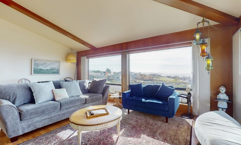 Watch gray whales breach from your living room as Pacific storms roll across the horizon. This hilltop retreat puts you above it all with sweeping ocean views from nearly every room. Three bedrooms sleep six comfortably. Just steps from the Pinnacle Gulch Trail leading to tide pools below. Fresh crab sandwiches at Spud Point are 2.5 miles away, Fishetarian Fish Market just 1.8 miles. The Sonoma Coast unfolds before you — where watching the sunset becomes the evening's main event.