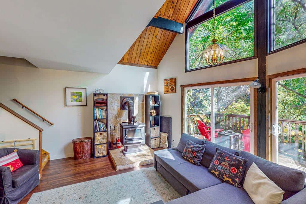 Austin Creek rushes past your deck at this whimsical cottage, where a sleeping loft and creative touches set the mood. Your dog will love exploring the fenced yard while you soak up the redwood-filtered light from colorful Adirondack chairs. This cheerful 2-bedroom retreat sleeps 4 and sits directly on the creek. Just 15 minutes from Guerneville's restaurants and 30 minutes from dramatic Salt Point State Park.