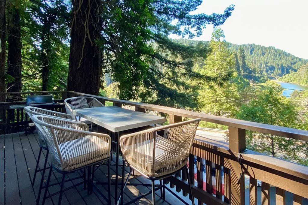 The Russian River glimmers through the trees below your hot tub at this dog-friendly Monte Rio lodge. This dog-friendly cottage perched above the water offers a gas fireplace and room for 4. Just 5 minutes from Guerneville's restaurants and 15 from the Sonoma Coast. Your deck becomes a front-row seat to river life — watch kayakers drift by as eagles soar overhead. This is Monte Rio magic: where time slows down and the river sets the pace.