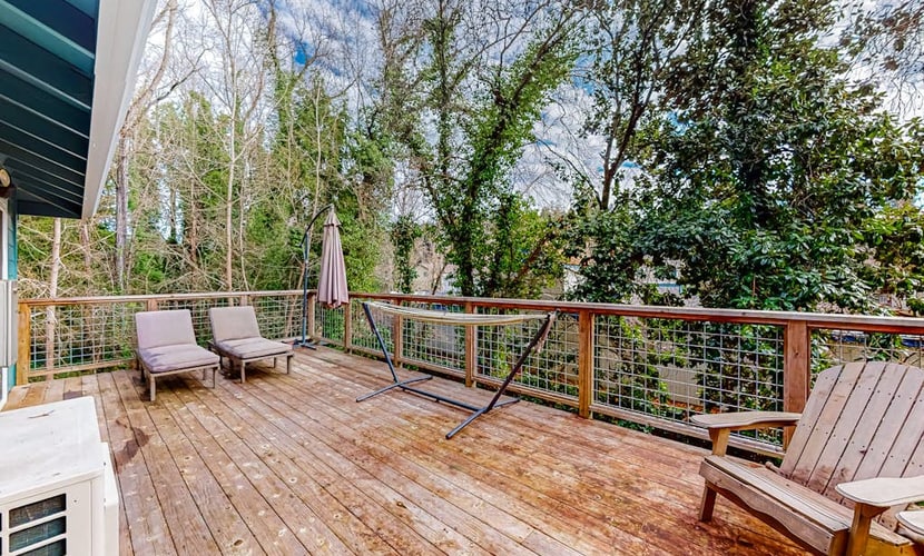Walk half a mile to downtown Guerneville's eclectic restaurants and Johnson's Beach from this dog-friendly home built in 2014 on Old River Road. Two bedrooms sleep 6, with mini-split AC in every room, multiple decks among the redwoods, and a gas grill for backyard dinners. Korbel Winery, Northwood Golf Course, and Armstrong Redwoods sit within three miles. Note: multiple stairs lead to the front door.