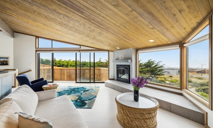 Sink into the hot tub beneath cypress trees as the sun melts into the Pacific, a few blocks inland from Portuguese Beach. This J. Carson Bowler-designed home frames coastal meadow and open ocean through walls of glass, with two king en-suite bedrooms sleeping 4. Bodega Bay's harbor and seafood shacks sit under five miles south; Jenner and the Russian River, seven miles north.