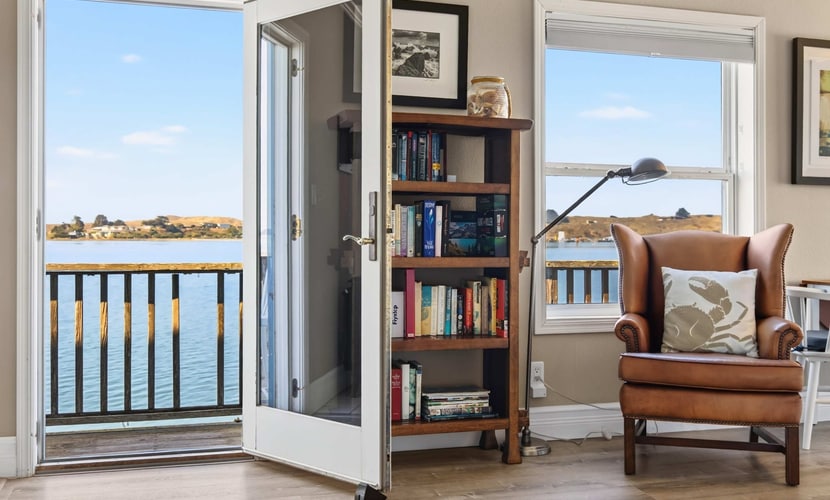 Wake to the cries of seabirds and watch fishing boats motor past from your waterfront perch. This intimate studio for two sits directly over Bodega Bay on weathered pilings — the water literally flows beneath you. Sip morning coffee on the narrow deck as harbor seals surface nearby. Just steps from Diekmann's Bay Store and The Boat House restaurant. An hour and a half from San Francisco, you'll find the coastal reset you've been craving.