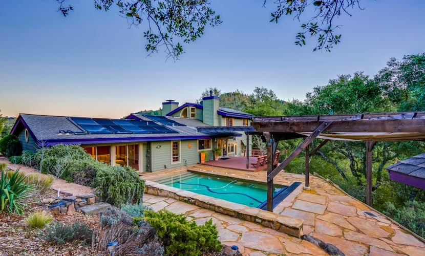 This contemporary hillside home sleeps 8 in four bedrooms, each with exposed beam ceilings and colorful designer touches. Just 10 miles from downtown Santa Rosa and minutes from Alexander Valley wineries. The gourmet kitchen has everything for cooking with farmers market finds.