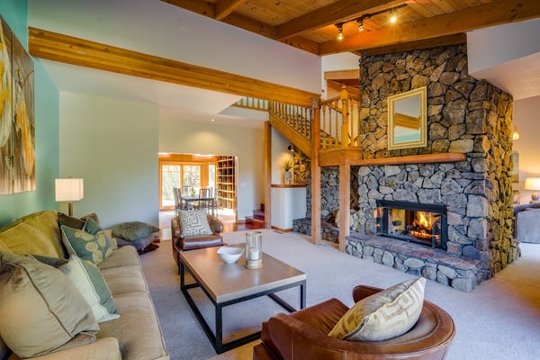 This contemporary hillside home sleeps 8 in four bedrooms, each with exposed beam ceilings and colorful designer touches. Just 10 miles from downtown Santa Rosa and minutes from Alexander Valley wineries. The gourmet kitchen has everything for cooking with farmers market finds.