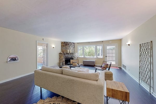 Furnished 30-night-minimum rental on Fitch Mountain, two miles from Healdsburg Plaza. Utilities and Wi-Fi included. Own washer and dryer, a desk, air conditioning, a full kitchen, and one designated parking spot. A 1940s Camp Rose cottage with a king bedroom, a twin room, and a private hot tub over the Russian River valley. Stays of 30 to 90 nights. No pets.