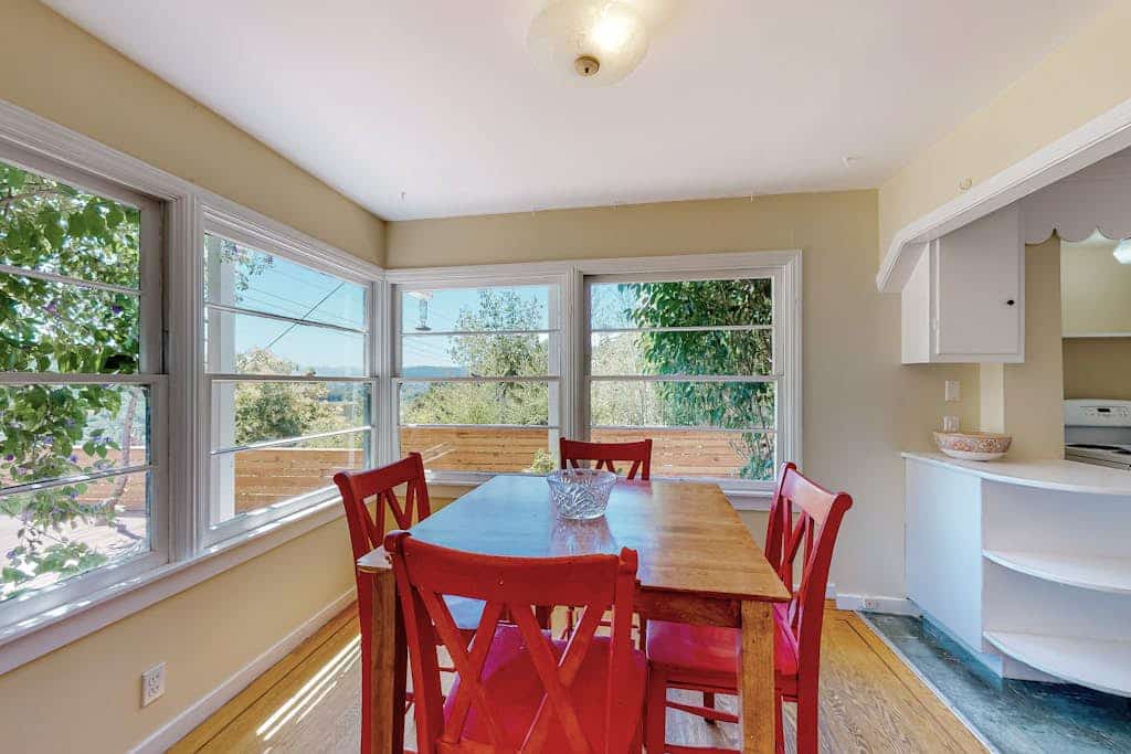 Furnished 30-night-minimum rental on Fitch Mountain, two miles from Healdsburg Plaza. Utilities and Wi-Fi included. Own washer and dryer, a desk, air conditioning, a full kitchen, and one designated parking spot. A 1940s Camp Rose cottage with a king bedroom, a twin room, and a private hot tub over the Russian River valley. Stays of 30 to 90 nights. No pets.