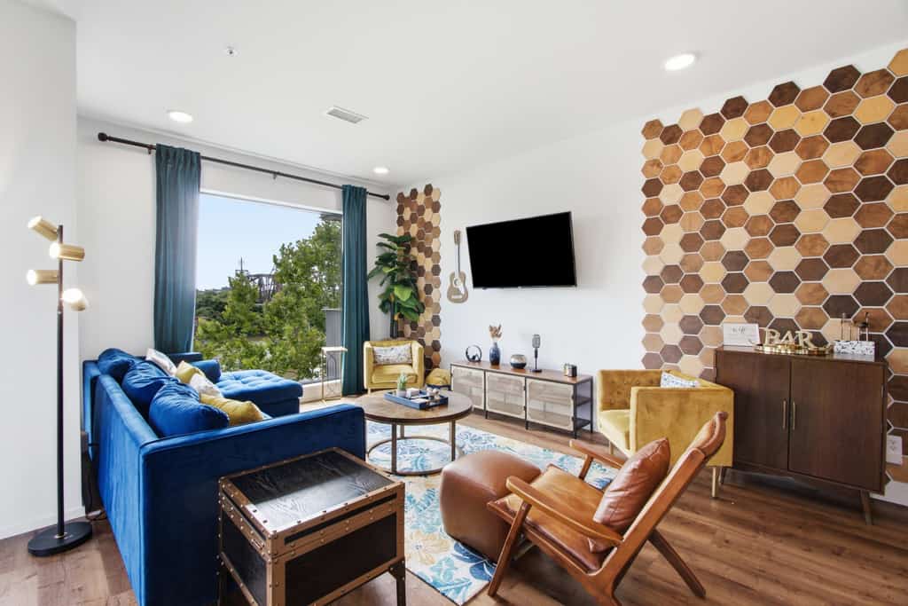 Modern river-view condo with balcony & WiFi - walk to downtown & attractions