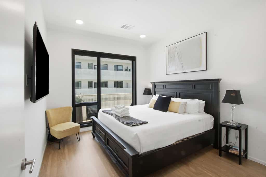 Experience the vibrant heart of Nashville from Illume 319, a stylish condominium. It offers a perfect blend of comfort and convenience. This apartment boasts a prime downtown location with stunning city views, providing easy access to museums, shopping, and entertainment. Enjoy modern amenities including a communal pool, gym, and a fully equipped kitchen, ensuring a relaxing stay. Illume 319 is designed for comfort and accessibility.