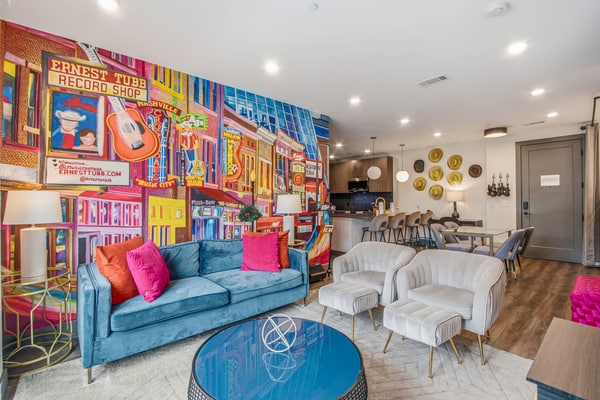 Stay at The Muse, a stylish 3-bedroom condo near downtown Nashville and Broadway. Sleeps up to 8 guests with a full kitchen, private balcony, fast WiFi, smart TVs, workspace, vinyl player, and Singtrix Karaoke. Enjoy building amenities including a rooftop lounge, fitness center, cornhole court, and elevator. A convenient home base for music lovers, families, groups, and business travelers.