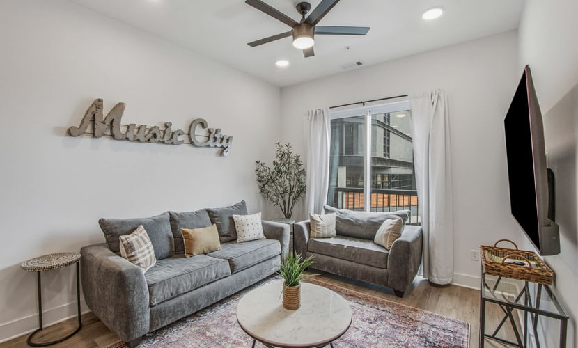 Enjoy a stylish 2-bedroom, 2-bath condo in East Nashville with space for up to 8 guests. Walk to local restaurants, bars, cafés, shops, and live music, with Five Points nearby. Nissan Stadium is just over a mile away, while Downtown Nashville is about 2 miles from the property. Relax on the shared rooftop deck after exploring Music City.